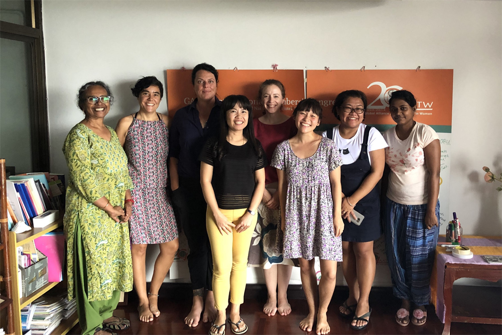 CAPI intern Kaylin with colleagues at the office