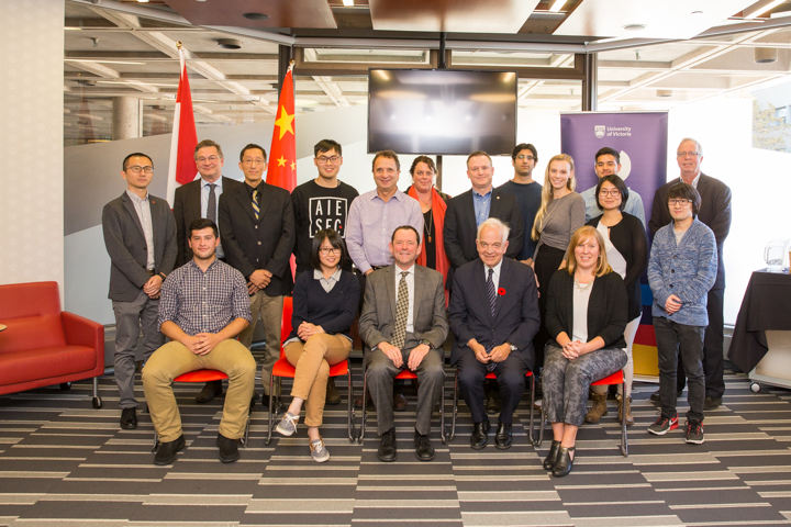 a formal group shot of the participants on hand during a visit by John McCallum, Canadian Ambassador to China