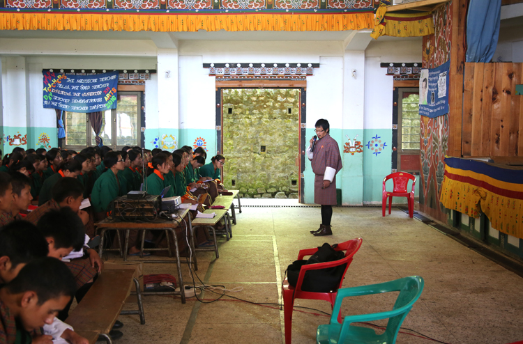 Nima Dorji visiting a high school in Bhutan to recruit for the new law school