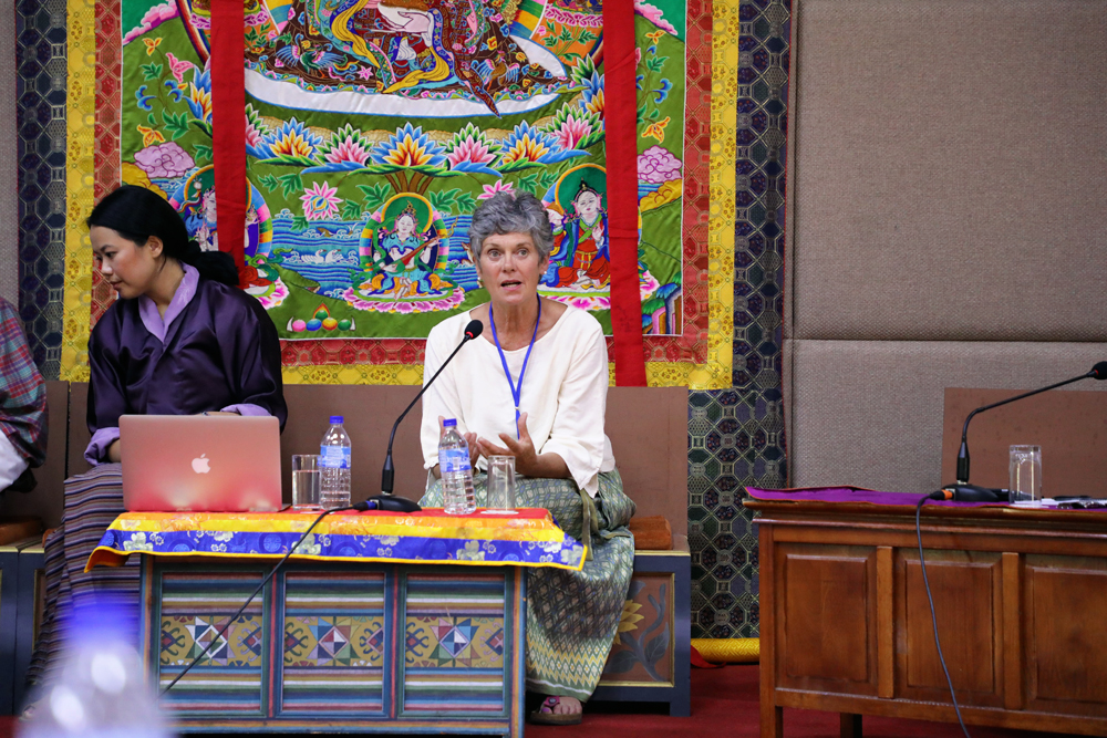 Helen Lansdowne speaking at a conference in Bhutan, 2019