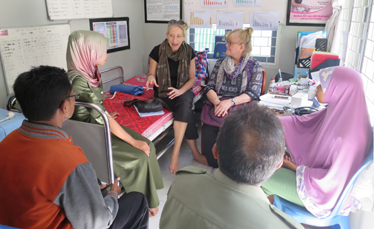 Drs. Ball and Beazley talking with research participants