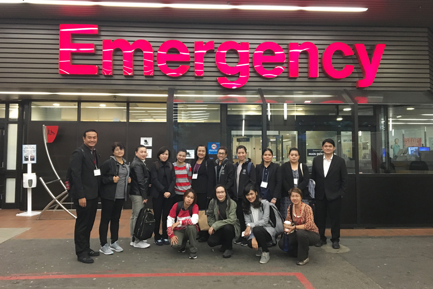photo of group of Thai health care professionals outside the emergency entrance of Vancouver General Hospital 