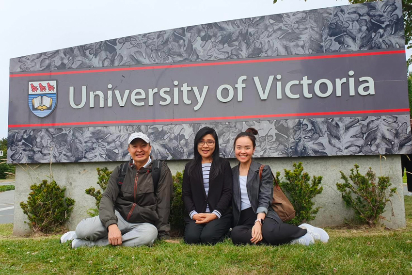 A few of the visiting Thai judges in front of the UVic sign