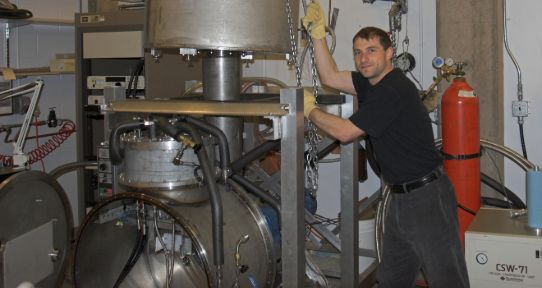 Armando Tura working in the cryogenics lab