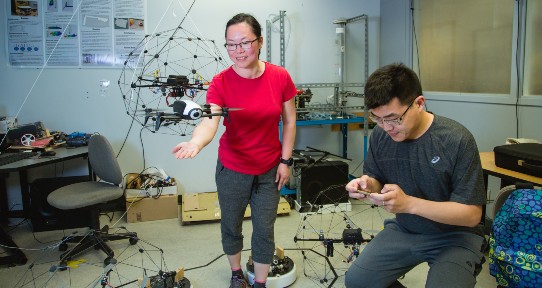 IESVic students Xinxin Shang and Alex Wei