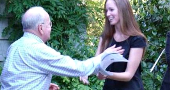 CFYS Research Fellow and generous donor Myer Horowitz goes to hug graduate student Jennifer Coverdale. 