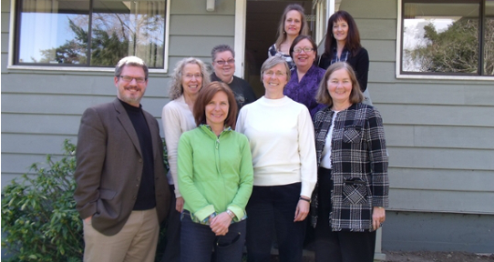 CFYS Research Fellows standing on the steps at University House 3