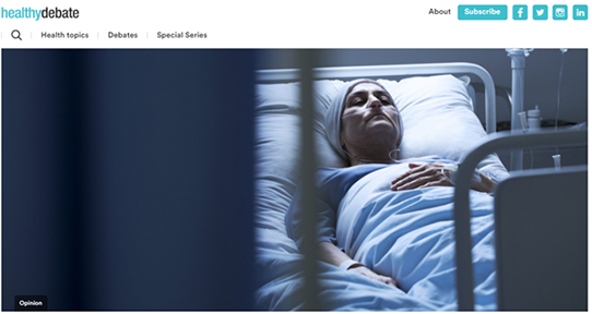 A photo of a woman lying in a hospital bed, taken as a screenshot from the healthy debate website
