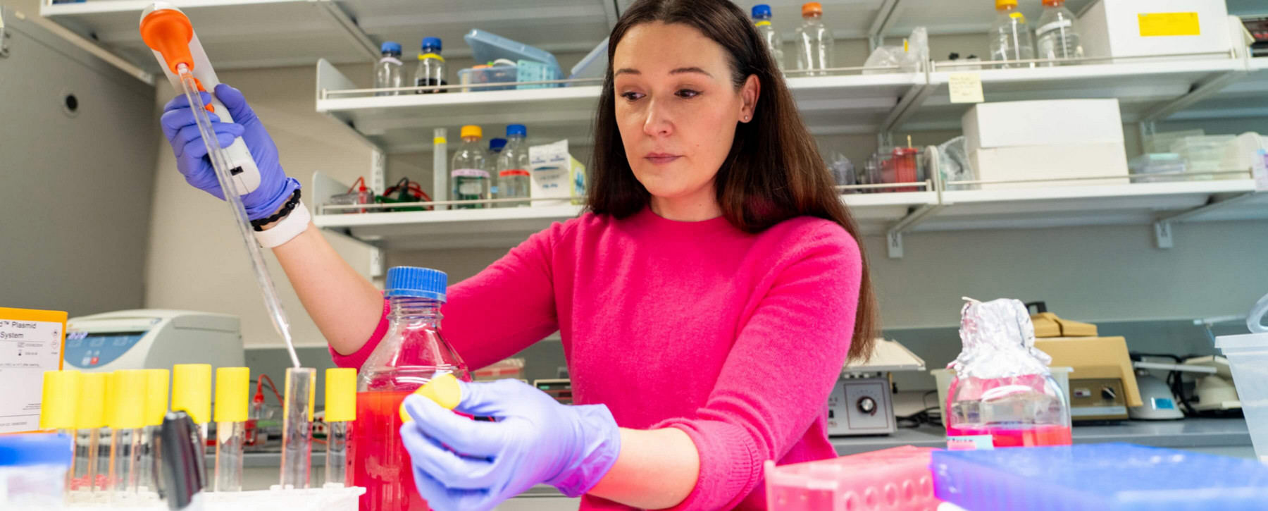 Microbiologist Lauren Davey at work in her lab