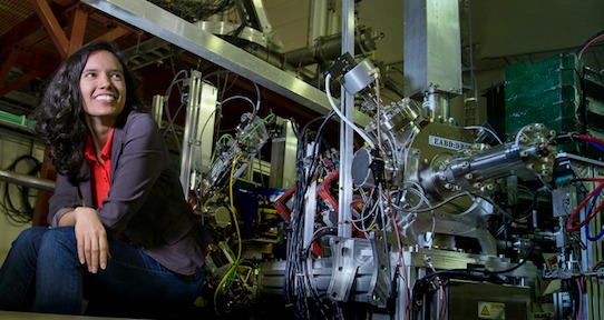 Graduate student Marla Cervantes in front of the UVic-led Advanced Rare Isotope Laboratory (ARIEL) at the TRIUMF lab