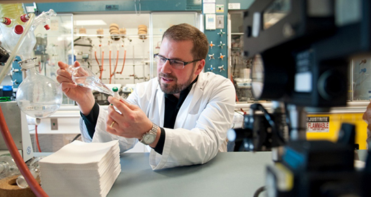 Jeremy Wulff seated in his lab