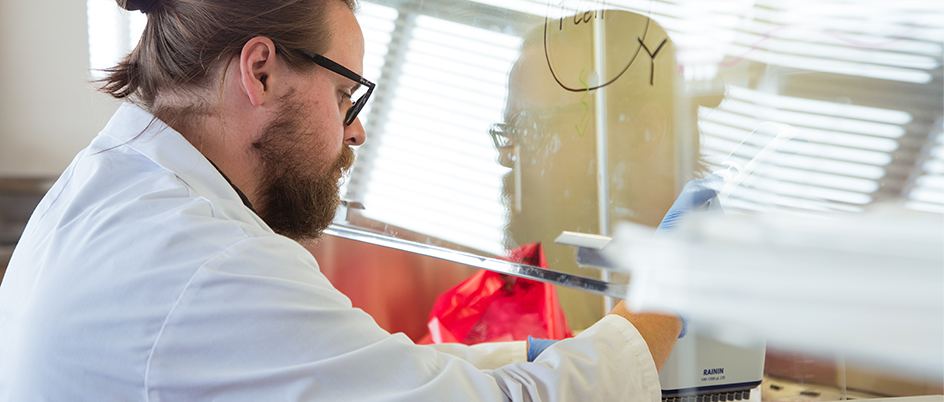 Student Julian Smazynsk in a lab