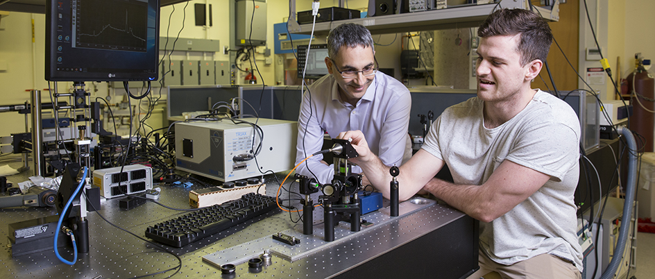 UVic chemistry professor working with a student in a lab