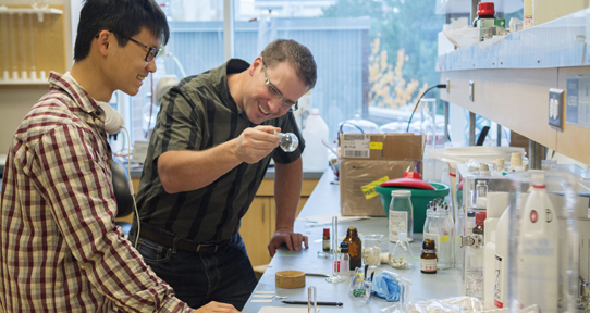 Student and instructor working in a lab