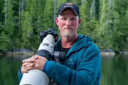 Paul Nicklen holding a camera