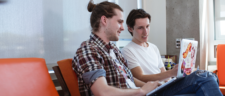 Two UVic students studying