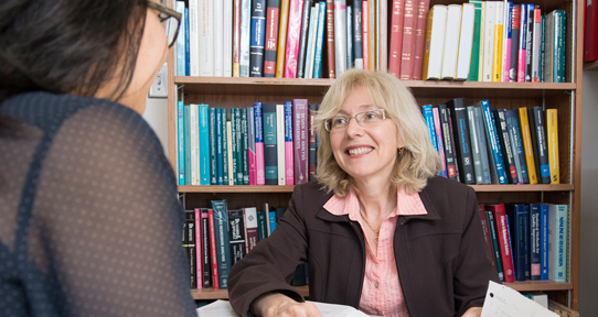 Lesperance with a student