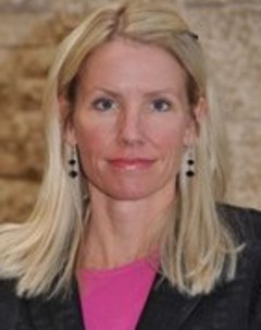 Headshot of Dr. Jennifer Cobb on neutral background.