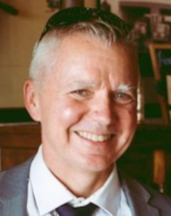 Smiling headshot of Dr. David Goodlett