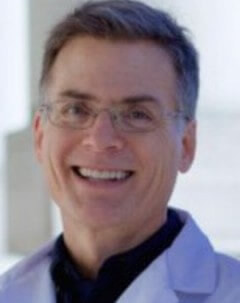 Smiling headshot of Dr. Brad Nelson on white background 
