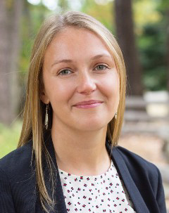 Dr. Lisa Reynolds smiling with a natural background
