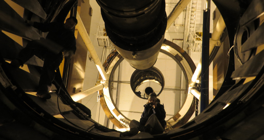 A student takes a mirror selfie at the CFH telescope during a co-op work term.