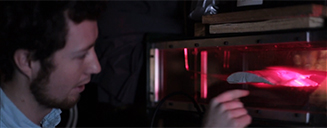 Student looking at equipment