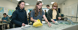 Students at a lab table