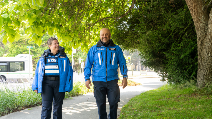 two UVic security officers walking on campus