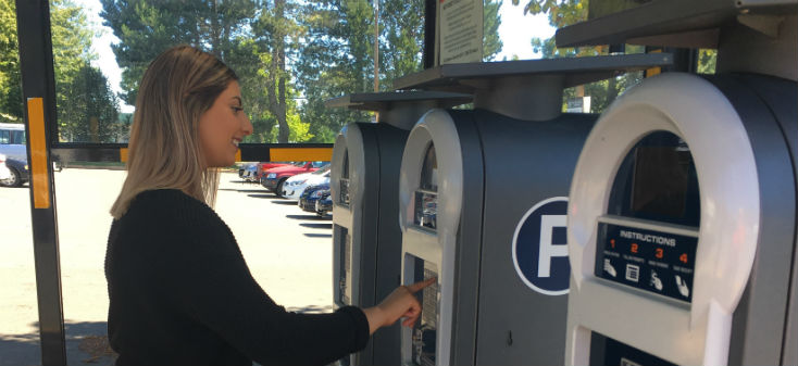 Woman paying for parking