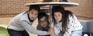 Students under a table