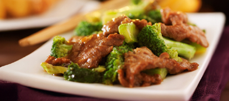 Beef and broccoli on a serving plate.
