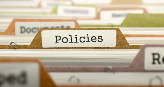 A filing drawer with one folder highlighted as Policies.