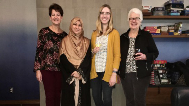 A group of four standing in order from left to right, Cynthia Johnston, Lamya Islam, Kate Fairley and Margaret Morrison. 