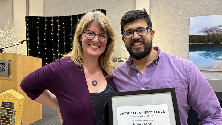 Gerald and Ryan receiving Excellence Award 2025