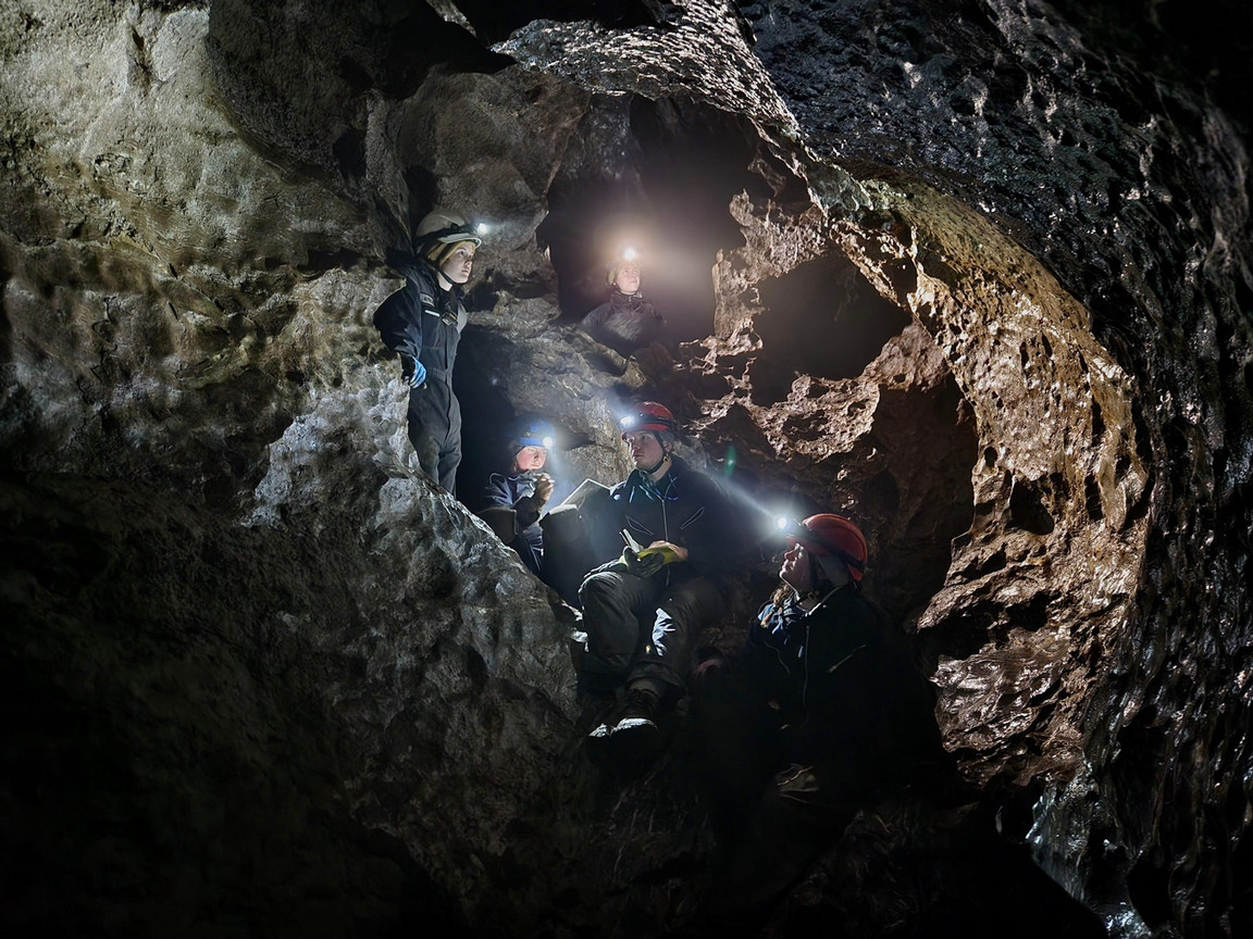 2023 Karst Geomorphology Field School Students surveying Mudslick Cave, Gordon River, Vancouver Island