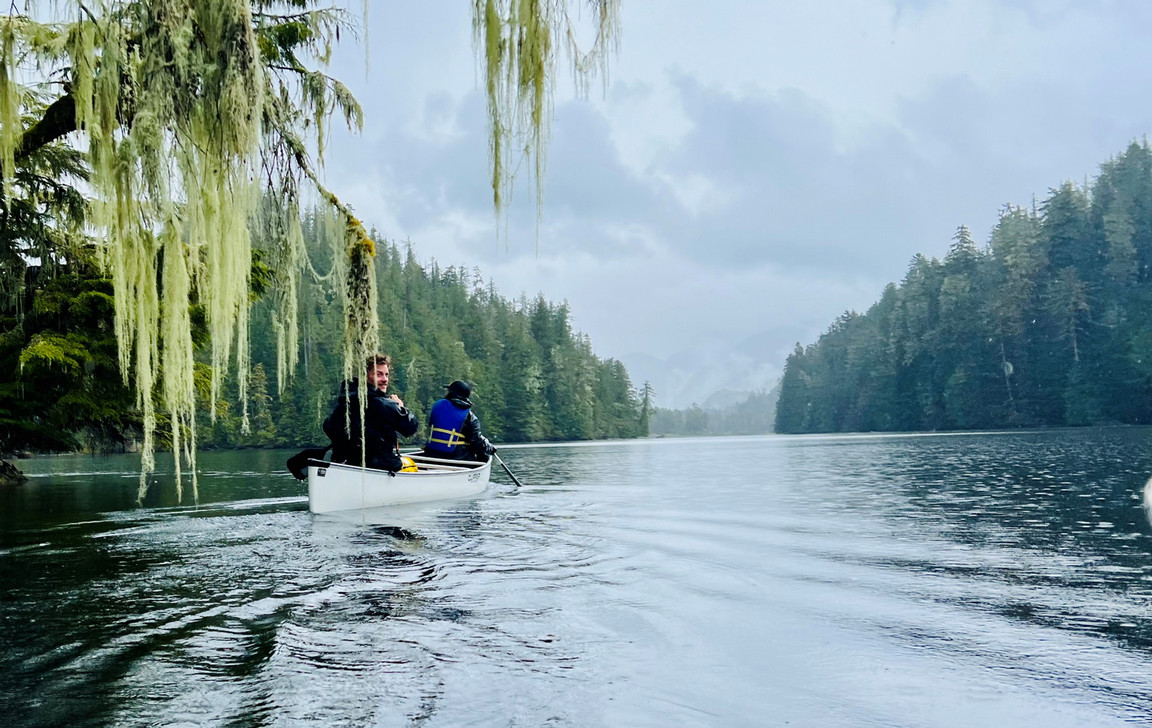 A student kayaking as part of the Koeye Field School experience