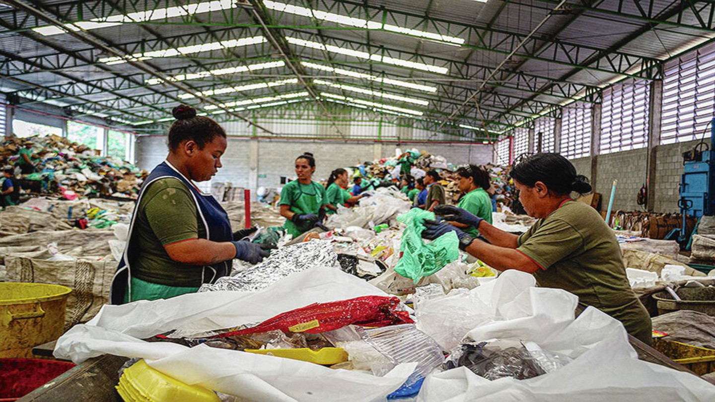 Waste pickers in Brazil sort through garbage