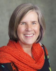 Headshot of June Saracuse