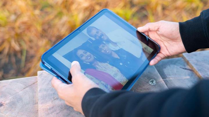 family photo on a tablet screen
