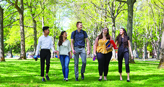 students walking in the UVic quad