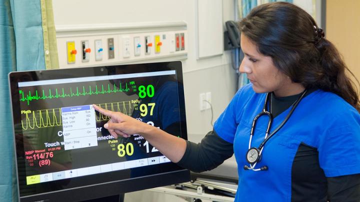 UVic nursing student in a hospital setting